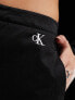 Calvin Klein Jeans parachute pants in black