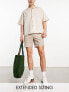 Фото #1 товара ASOS DESIGN slim chino shorts in mid length in beige