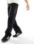 Weekday Frej relaxed fit workwear trousers with pocket detail in black