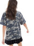 Фото #7 товара ASOS DESIGN oversized t-shirt with graphic in washed camo print