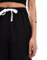 Фото #4 товара ASOS DESIGN Tall pull on trouser with contrast panel in black