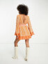 River Island embroidered ruffle hem mini beach dress with floaty sleeves in orange