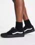 Vans SK8-Low trainers in black with white side stripe