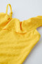 1-6 years/ textured swimsuit with ruffles