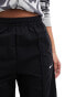 Фото #5 товара Nike Trend woven baggy parachute pants in black