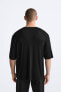 T-SHIRT WITH BUTTONED NECK