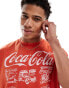 ASOS DESIGN unisex oversized license t-shirt with Coca-Cola graphic front print in washed red