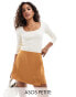 Фото #1 товара ASOS DESIGN Petite wrap satin skirt in golden dusk