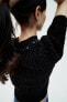 Beaded knit sweater