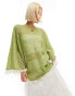 Labelrail x Olivia Grace Herring crochet tassle poncho in green