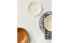 Earthenware side plate with raised-design edge