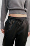 Faux leather jogging trousers