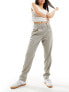 Vero Moda tapered trousers with pleat front in light grey pinstripe