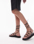 Topshop – Gina – Flache Riemchensandalen in Schwarz mit Knöchelriemen