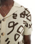 Фото #3 товара ASOS DESIGN co-ord knitted button through polo in stone with brown all over pattern