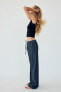 FLOWING DENIM-EFFECT TROUSERS