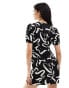 Wednesday's Girl v-neck short sleeve mini dress in black and white swirl