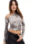 ASOS DESIGN asymmetric long sleeve top in snake print