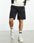 Фото #2 товара Champion Legacy Bermuda cargo shorts in black