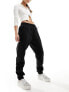 adidas Originals Leopard Luxe joggers in black and leopard three stripe