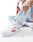 Reebok Club C Revenge trainers in white and red