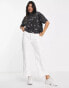 ASOS DESIGN boxy high neck tee in daisy embroidery in washed charcoal