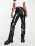 Фото #1 товара Monki patent straight leg trousers in black