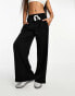 Фото #4 товара ASOS DESIGN Petite pull on trouser with contrast panel in black