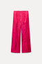 CREASED-EFFECT WIDE-LEG TROUSERS