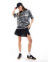 ASOS DESIGN oversized t-shirt with graphic in washed camo print