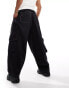 Фото #5 товара ASOS DESIGN oversized balloon jeans with cargo pockets in black with contrast stitch