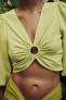 Short shirt with ring detail