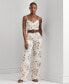 Фото #1 товара Women's Belted Floral Jumpsuit