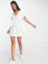 ASOS DESIGN button through mini smock dress in white with yellow floral embroidery