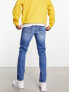 Фото #3 товара ASOS DESIGN skinny jeans in mid wash blue