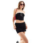 Фото #1 товара Bershka fold over waistband mini skirt in black