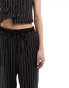 Reclaimed Vintage wide leg pull on pinstripe trouser with satin waistband detail