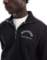 Tommy Hilfiger arch logo half zip sweatshirt in black