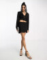 Фото #1 товара Annorlunda wrap around mini skirt co-ord in black