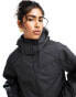 ASOS DESIGN rubberised chuck on rain jacket with pocket detail in black