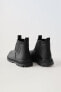 Rubberised boots