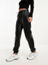 Фото #1 товара Stradivarius faux leather jogger in black