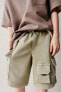 Soft multi-pocket bermuda shorts