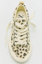 Leopard plimsolls