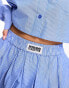 Фото #2 товара ASOS DESIGN Weekend Collective co-ord pleated mini skirt with woven label in blue stripe