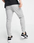 Nike Training Dri-FIT tapered joggers in light grey