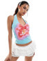 ASOS DESIGN plunge halter top with large floral graphic in turquoise