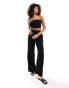 In The Style x Perrie Sian exclusive textured tie waist wide leg beach trousers in black