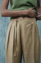 DARTED TROUSERS WITH BUCKLE