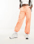 ASOS DESIGN parachute cargo trouser with seam detail in washed coral